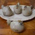 D07. Pottery chickens and platter. 
